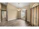 Inviting dining room with a chandelier, large window and hardwood floors at 2883 Sw 66Th St, Ocala, FL 34476