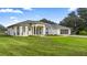 White house exterior with a large green lawn at 2883 Sw 66Th St, Ocala, FL 34476