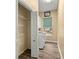 Convenient laundry room includes a washer, dryer, and shelving, enhancing the home's functionality at 2883 Sw 66Th St, Ocala, FL 34476