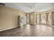 Expansive living room featuring hardwood floors, large windows, and neutral-toned walls at 2883 Sw 66Th St, Ocala, FL 34476