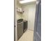 Laundry room with washer, dryer and storage shelves at 4036 Sw 57Th Ct, Ocala, FL 34474