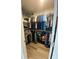 Large walk-in closet with ample shelving and hanging space at 4036 Sw 57Th Ct, Ocala, FL 34474