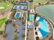 Community amenities including tennis courts, pools, and parking at 4775 Nw 35Th Lane Rd, Ocala, FL 34482