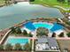 Community pool and spa with shade structures and lounge areas at 4775 Nw 35Th Lane Rd, Ocala, FL 34482