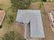 Aerial view showcasing the home's roofline and landscaping at 4945 Nw 33Rd Ln, Ocala, FL 34482