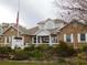 Brick clubhouse with landscaping and American flag at 4945 Nw 33Rd Ln, Ocala, FL 34482