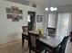 Dining room with a table for six and access to the kitchen at 5242 Sw 162Nd Place Rd, Ocala, FL 34473