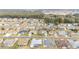 Aerial view of a residential neighborhood, showing houses and streets at 5470 Nw 26Th Lane, Ocala, FL 34482