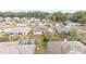 Aerial view of a residential neighborhood with houses and lush greenery at 5470 Nw 26Th Lane, Ocala, FL 34482