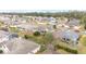 Aerial view showcasing a residential neighborhood with houses and landscaping at 5470 Nw 26Th Lane, Ocala, FL 34482