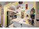 Modern kitchen featuring stainless steel refrigerator and light cabinets at 5470 Nw 26Th Lane, Ocala, FL 34482