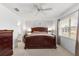 Comfortable bedroom with a king-size bed and en-suite bathroom at 6151 Sw 84Th St, Ocala, FL 34476