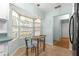 Kitchen nook with window seat and small table at 6151 Sw 84Th St, Ocala, FL 34476