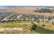 Aerial view showing houses near golf course and lake at 6839 Sw 97Th Terrace Rd, Ocala, FL 34481