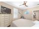 Bedroom with neutral decor, large windows, and ample closet space at 6839 Sw 97Th Terrace Rd, Ocala, FL 34481