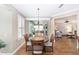 Breakfast nook with glass table and view of living room at 6839 Sw 97Th Terrace Rd, Ocala, FL 34481