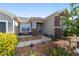 Landscaped front yard with paver walkway and stone accents at 6839 Sw 97Th Terrace Rd, Ocala, FL 34481