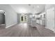 Bright dining area with french doors leading to the backyard, and an island kitchen at 7084 Se 124 St, Belleview, FL 34420