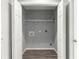 Laundry closet with wire shelving and hookups at 7084 Se 124 St, Belleview, FL 34420