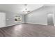 Bright living room with wood-look floors and high ceilings at 7084 Se 124 St, Belleview, FL 34420