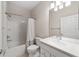 Clean bathroom with bathtub, shower, and white vanity at 7402 Sw 99Th Ave, Ocala, FL 34481