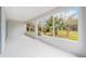 Screened porch with view of backyard at 7402 Sw 99Th Ave, Ocala, FL 34481