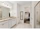 Elegant bathroom with double vanity and granite countertops at 7752 Sw 96Th Avenue Rd, Ocala, FL 34481