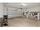 Garage with ample storage and overhead door at 7752 Sw 96Th Avenue Rd, Ocala, FL 34481