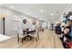 Dining area with round table and chairs, adjacent to living room at 8332 Sw 54Th Loop, Ocala, FL 34481