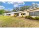 Spacious backyard with a view of the home's exterior at 8540 Sw 90Th Pl # B, Ocala, FL 34481