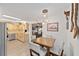 Casual breakfast nook with wood table and light-colored chairs at 8540 Sw 90Th Pl # B, Ocala, FL 34481