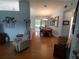 Bright dining room with hardwood floors and round wooden table at 8623 Sw 108Th Place Rd, Ocala, FL 34481