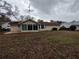 House exterior with backyard view at 8623 Sw 108Th Place Rd, Ocala, FL 34481