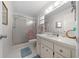 Bathroom features a large shower and updated vanity at 8671 Sw 97Th St # C, Ocala, FL 34481