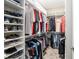 Large walk-in closet with ample shelving and hanging space at 8878 Sw 103Rd Cir, Ocala, FL 34481