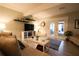 Comfortable living room with tiled floors, and sliding glass doors at 11001 Se Sunset Harbor Rd # E 33, Summerfield, FL 34491