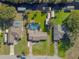 Bird's eye view of house, pool, and large lot at 11418 Lake Eustis Dr, Leesburg, FL 34788