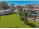 Large backyard with pool, shed, and lush landscaping at 11418 Lake Eustis Dr, Leesburg, FL 34788