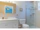 Clean bathroom with updated vanity and shower at 11418 Lake Eustis Dr, Leesburg, FL 34788