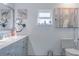 Elegant bathroom with double vanity and marble countertop at 11418 Lake Eustis Dr, Leesburg, FL 34788