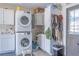 Convenient laundry room with stackable washer and dryer at 11418 Lake Eustis Dr, Leesburg, FL 34788