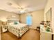 Bright bedroom with a king-size bed and window coverings at 15715 Sw 11Th Terrace Rd, Ocala, FL 34473