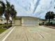 A home showcasing a driveway with unique palm tree design at 15715 Sw 11Th Terrace Rd, Ocala, FL 34473