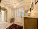 Bright entryway with tile flooring, console table, and view of hallway at 15715 Sw 11Th Terrace Rd, Ocala, FL 34473