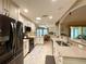Spacious kitchen with granite countertops, stainless steel appliances, and an island at 15715 Sw 11Th Terrace Rd, Ocala, FL 34473