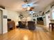 Inviting living room with vaulted ceilings, hardwood floors, and comfortable seating at 15715 Sw 11Th Terrace Rd, Ocala, FL 34473