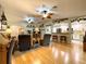 Comfortable living room featuring hardwood floors and an opening to the kitchen at 15715 Sw 11Th Terrace Rd, Ocala, FL 34473