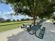Enjoy community recreation with shaded picnic tables near the baseball field at 15715 Sw 11Th Terrace Rd, Ocala, FL 34473