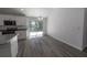 Dining area adjacent to kitchen with sliding glass doors to backyard at 16434 Se 57 Pl, Ocklawaha, FL 32179