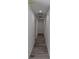 Clean, bright hallway with recessed lighting and modern flooring provides access to all areas at 16434 Se 57 Pl, Ocklawaha, FL 32179